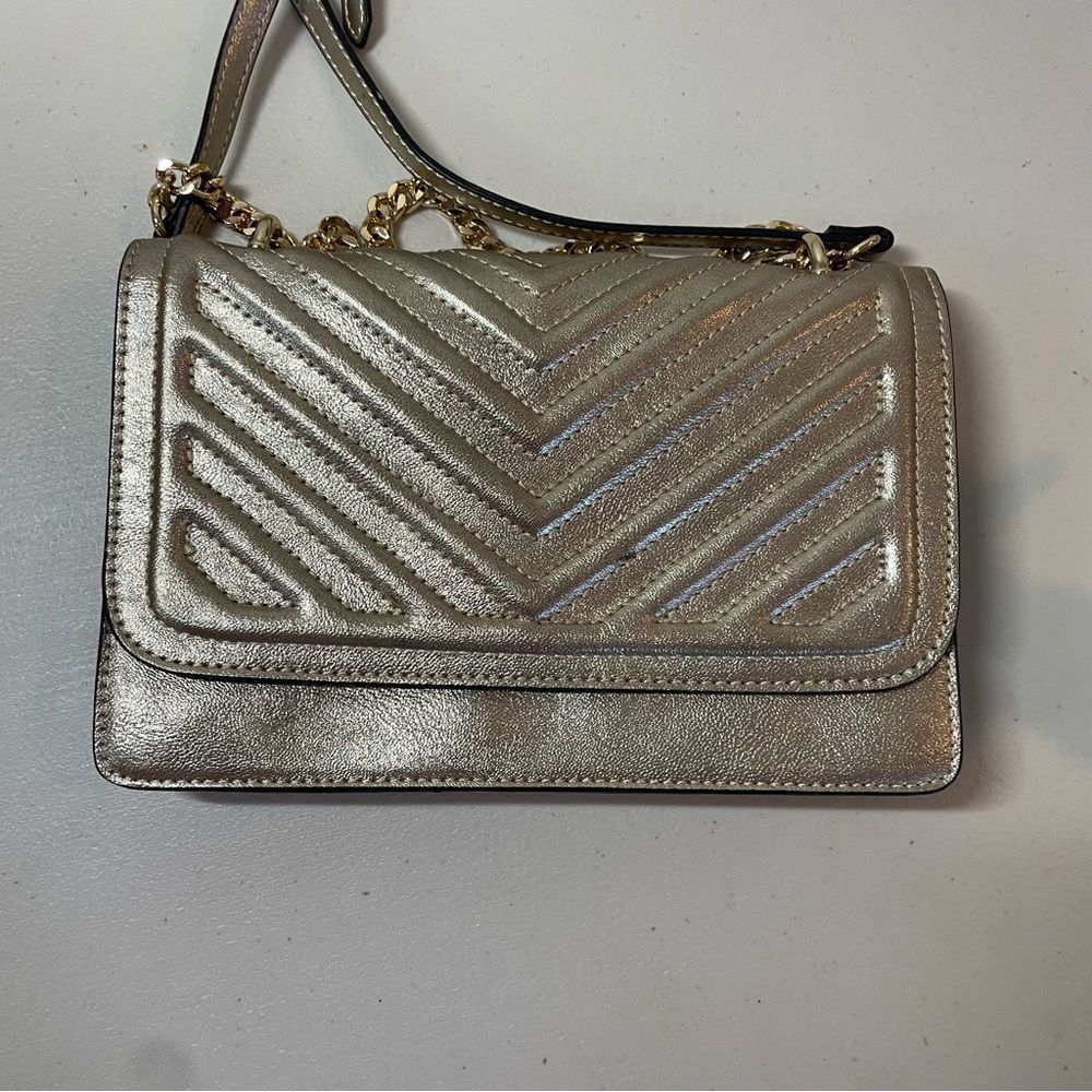 Aldo Gold Crossbody Purse in great condition.